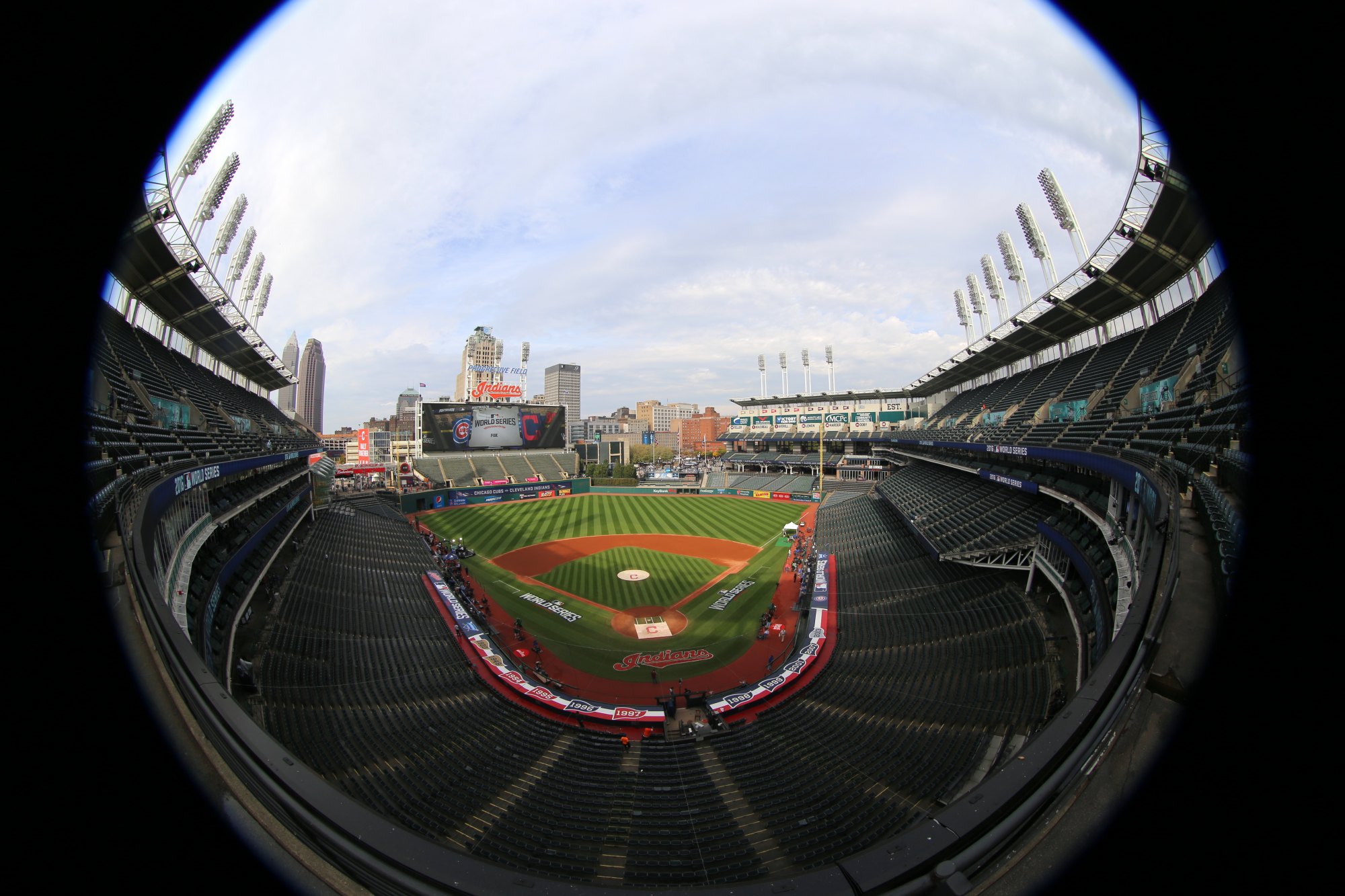 A baseball stadium photographed with a fisheye lens: the whole stadium fits in a circle and straight lines bend